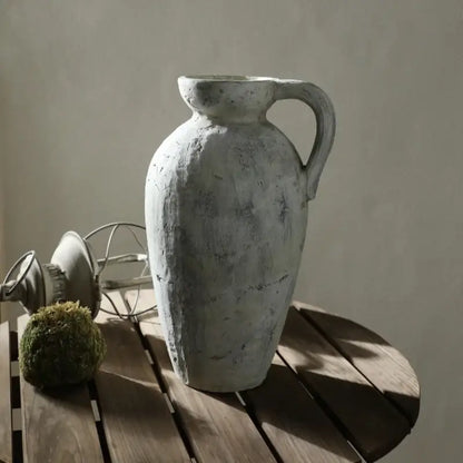 White ceramic pottery vase with a distressed finish and tall amphora-style silhouette on Tampa Home & Garden Store