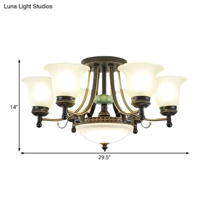 Chandelier with rustic black and gold metal frame and frosted glass flower shades Decorbites on Tampa Home & Garden Store