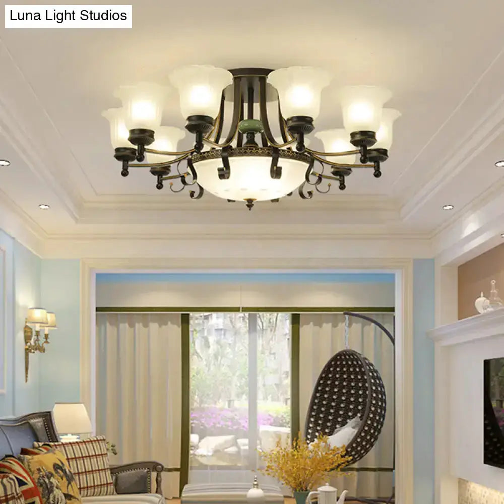 Rustic black and gold glass flower ceiling light fixture with shades in living room on Tampa Home & Garden Store