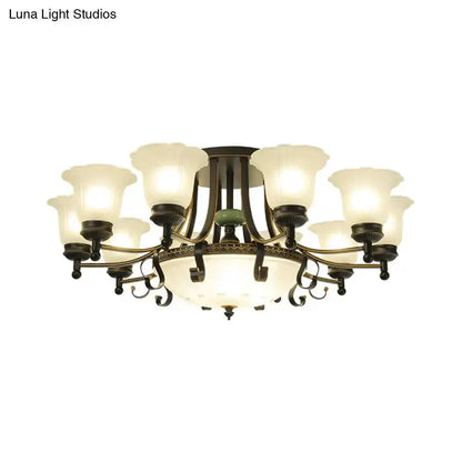 Rustic black and gold glass flower ceiling light fixture with eight frosted glass shades on Tampa Home & Garden Store