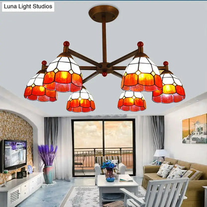 Amber Stained Glass Chandelier with six warm amber shades by Decorbites in a cozy living room on Tampa Home & Garden Store