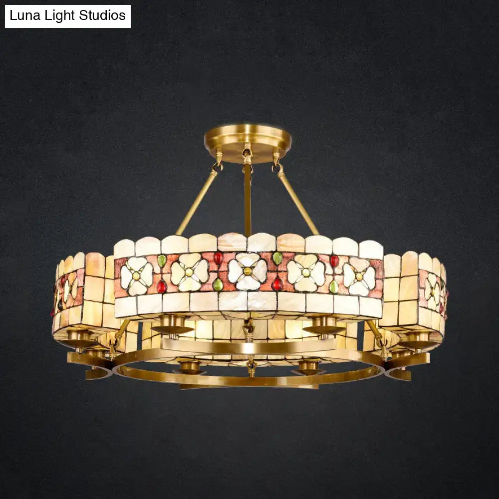 Brass stained glass chandelier by Decorbites with round floral white panels on Tampa Home & Garden Store