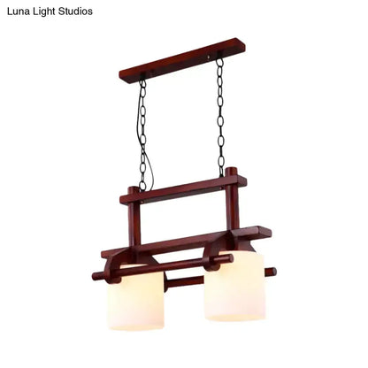 Rustic wood island pendant light with white glass shades for dining room on Tampa Home & Garden Store