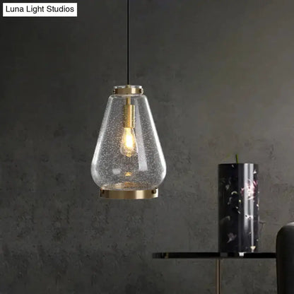 Modern seeded glass pendant light with brass rim by Decorbites for bedroom on Tampa Home & Garden Store