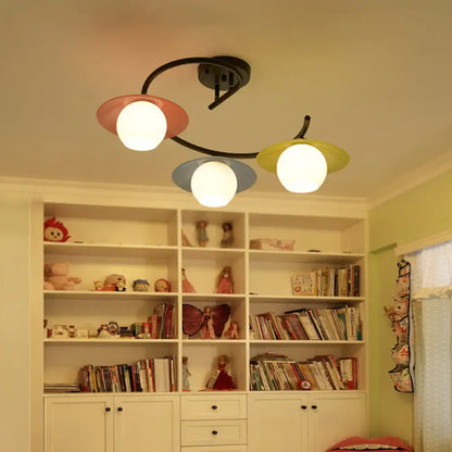 Saucer semi flush light fixture with three colored saucers and white globes on Tampa Home & Garden Store