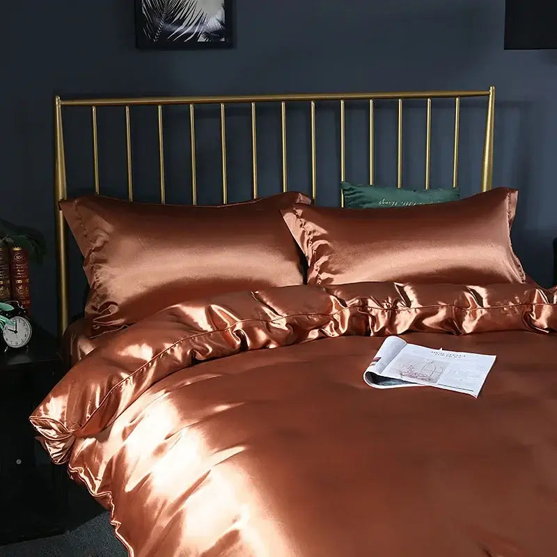 Decorbites pink satin bedding set with duvet cover and sheet on a gold metal bed frame on Tampa Home & Garden Store