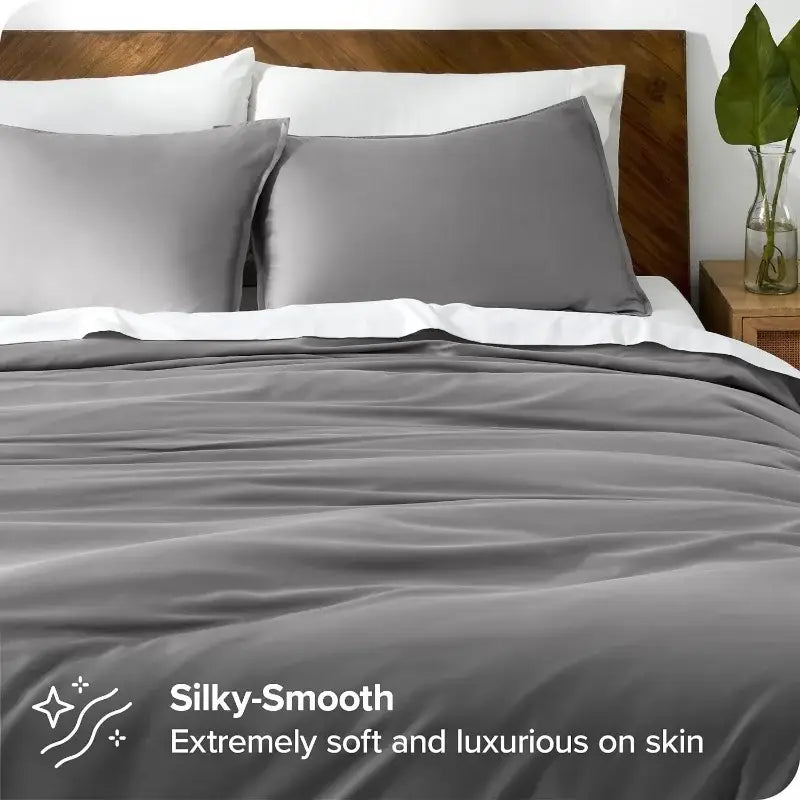 Blue Satin Duvet Cover Set Decorbites on a bed with silky satin and pillowcases on Tampa Home & Garden Store
