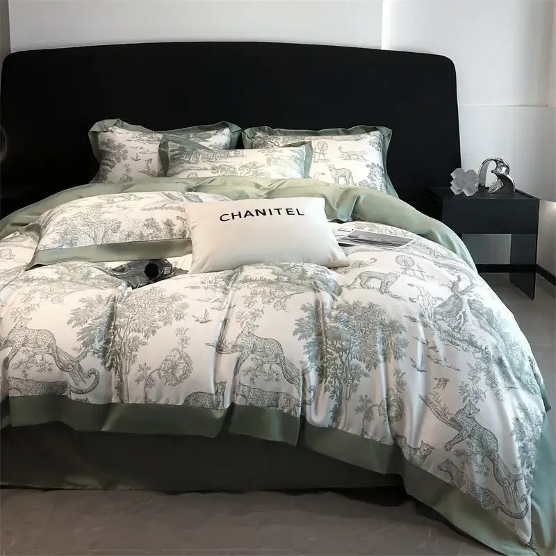 Decorbites blue eucalyptus duvet cover set on bed with teal border and elephant print on Tampa Home & Garden Store