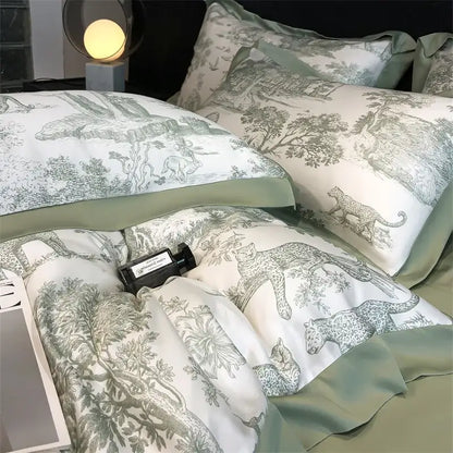 Blue Eucalyptus Duvet Cover by Decorbites with toile print and sage piping, pillow shams on Tampa Home & Garden Store