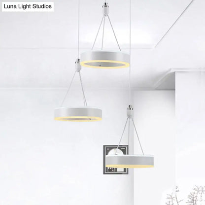 Silver cluster ceiling light with three white ring pendants and warm inner glow, Decorbites on Tampa Home & Garden Store