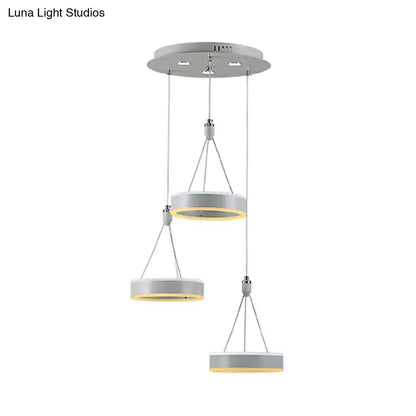 Silver cluster ceiling light with three hanging circular rings and gold accents Decorbites on Tampa Home & Garden Store