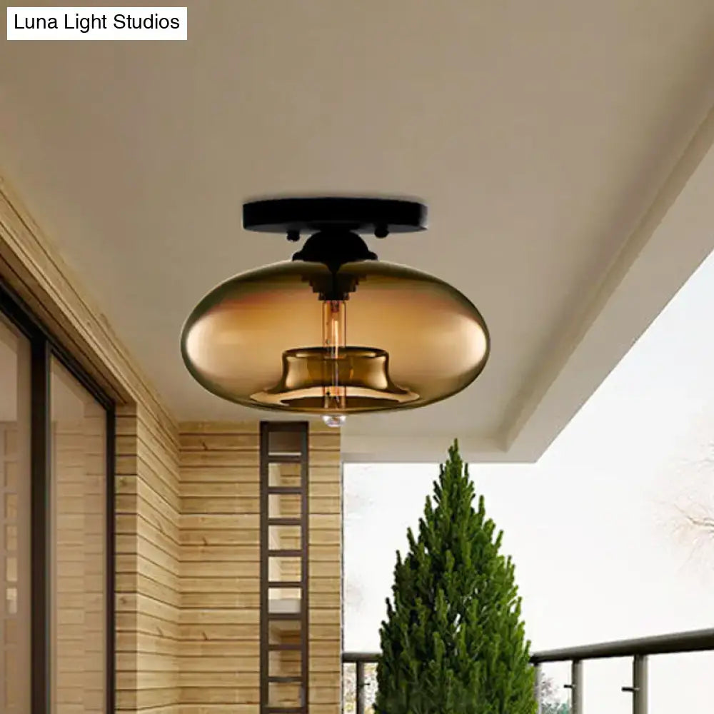Glass oval flush mount light amber glass with bronze hardware by Decorbites on Tampa Home & Garden Store