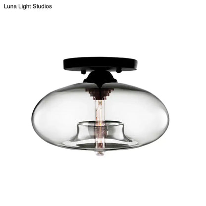 Glass Oval Flush Mount light with clear glass globe and black canopy, Decorbites on Tampa Home & Garden Store
