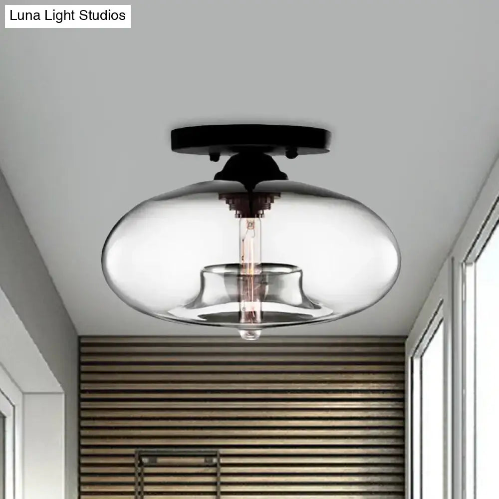Glass oval flush mount ceiling light with clear glass shade and black canopy Decorbites on Tampa Home & Garden Store