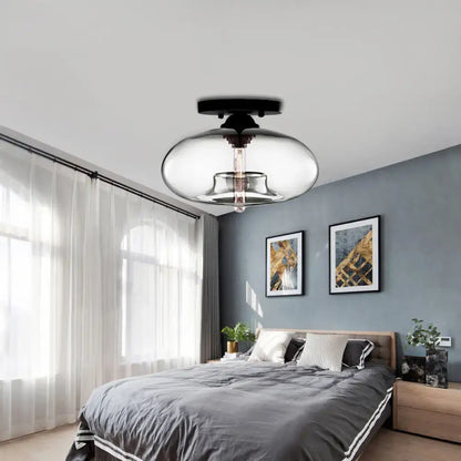 Glass oval flush mount ceiling light by Decorbites, clear glass with black in bedroom on Tampa Home & Garden Store