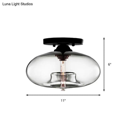 Glass oval flush mount light with clear bubble shade and black mount Decorbites on Tampa Home & Garden Store