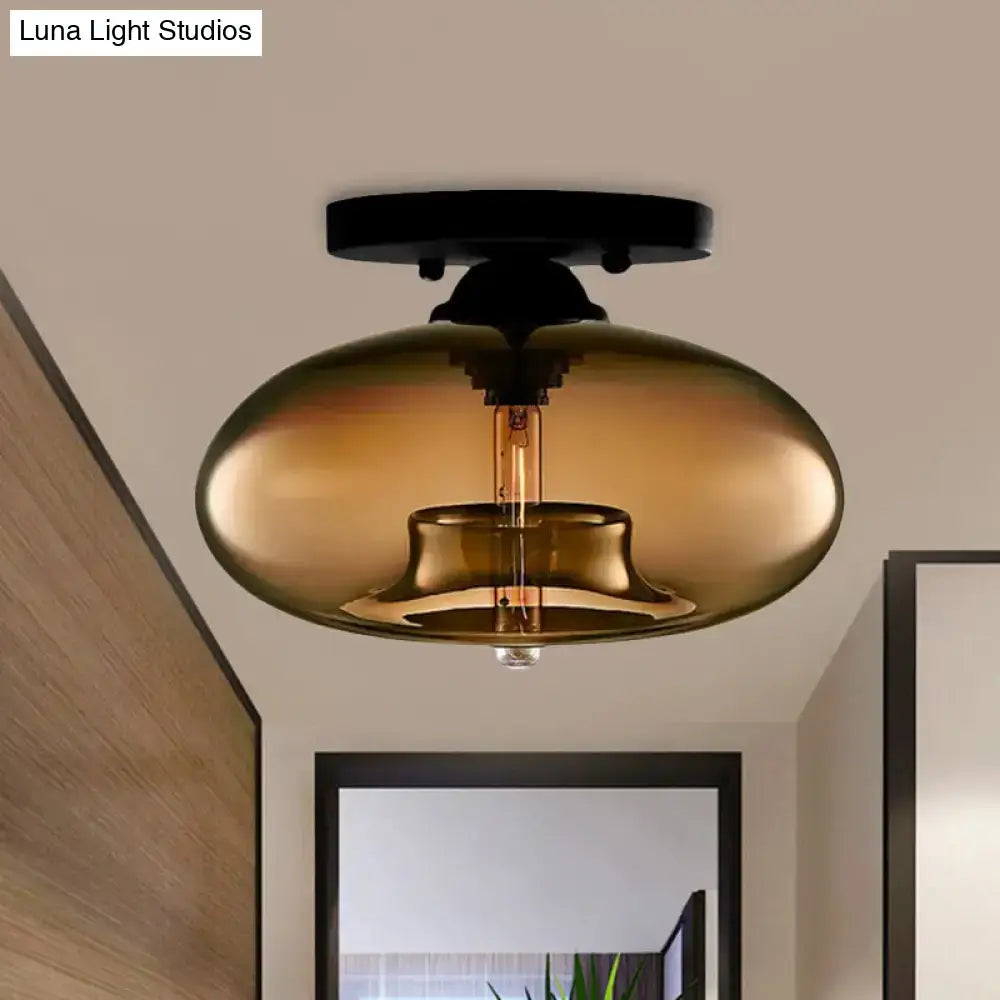 Glass Oval Flush Mount light with amber glass shade and black canopy by Decorbites on Tampa Home & Garden Store