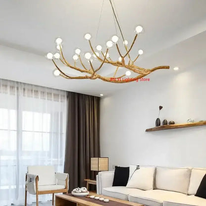 Golden iron tree branch chandelier by Decorbites with bubble globe bulbs for dining room on Tampa Home & Garden Store