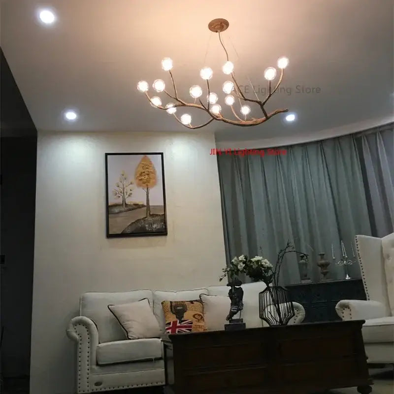 Chandelier: Golden iron tree-branch bubble chandelier by Decorbites for dining room lighting on Tampa Home & Garden Store