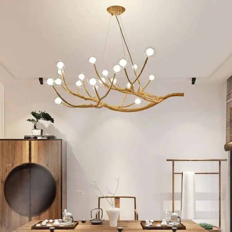 Golden iron tree branch bubble chandelier by Decorbites for dining room on Tampa Home & Garden Store