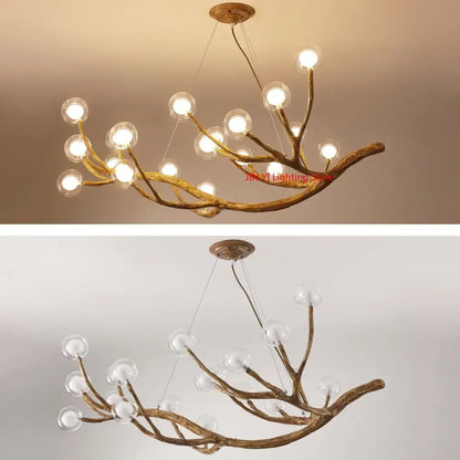 Golden iron tree branch chandelier with glass bulb lights Decorbites on Tampa Home & Garden Store