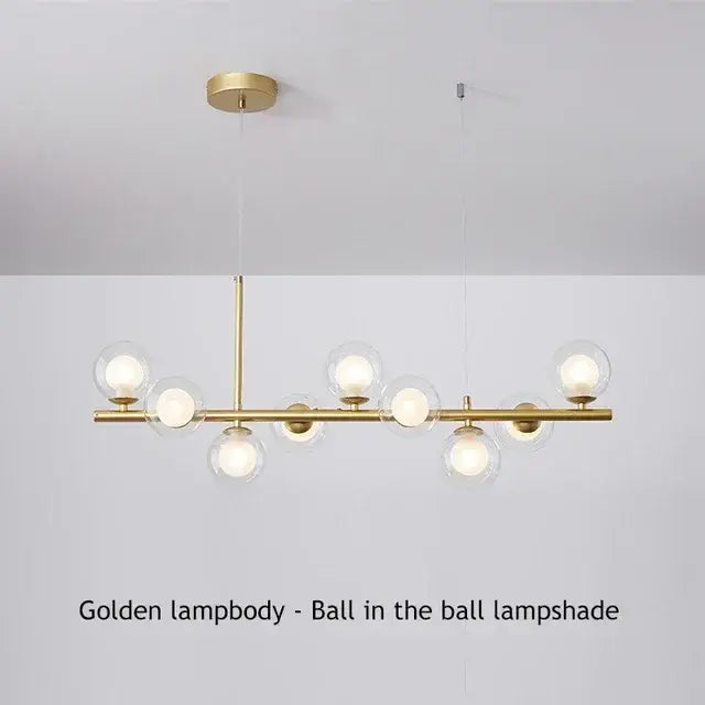 Black Glass Ball Chandelier by Decorbites with brass-tone bar and clear glass globes on Tampa Home & Garden Store