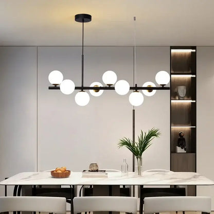 Black Glass Ball Chandelier by Decorbites with a black bar and nine white globes on Tampa Home & Garden Store