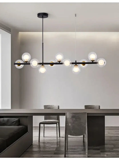 Black glass ball chandelier by Decorbites with a metal bar and globe bulbs, dining lighting on Tampa Home & Garden Store