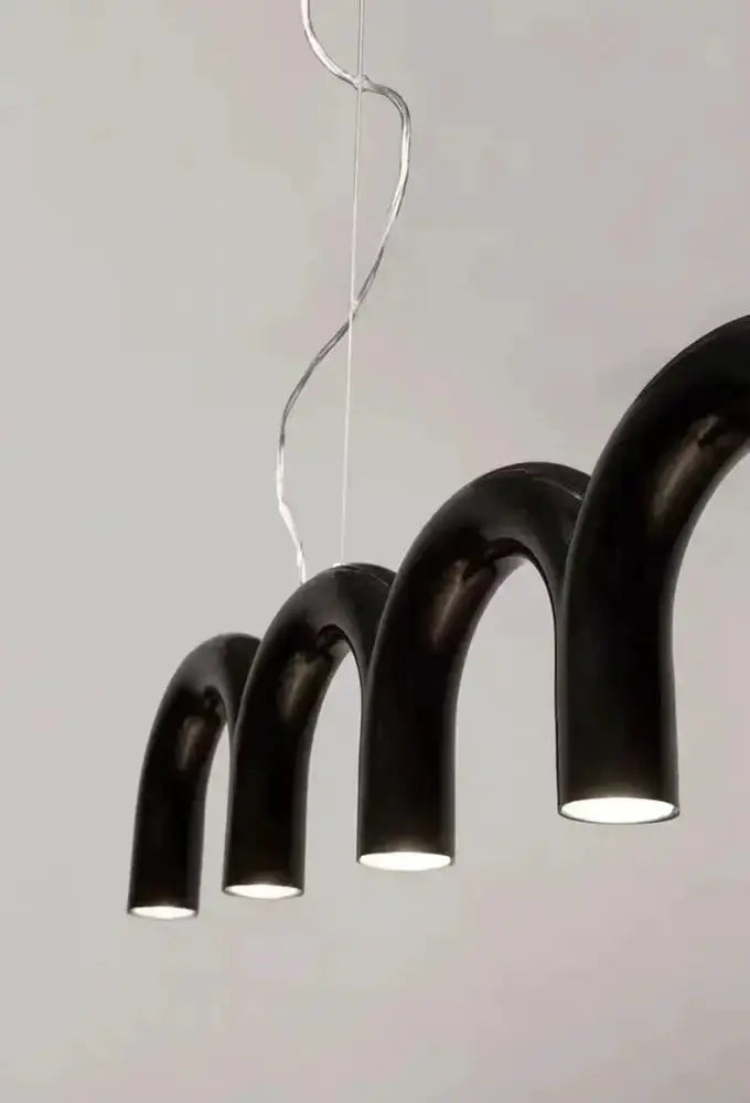 Modern black U-shaped chandelier by Decorbites with four curved pendant arms on Tampa Home & Garden Store