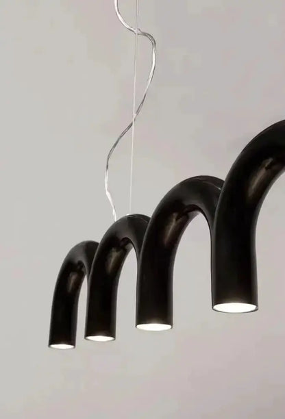 Modern black U-shaped chandelier by Decorbites with four curved pendant arms on Tampa Home & Garden Store