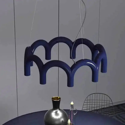 Chandelier Decorbites modern black U-shaped design with looping arches over dining area on Tampa Home & Garden Store