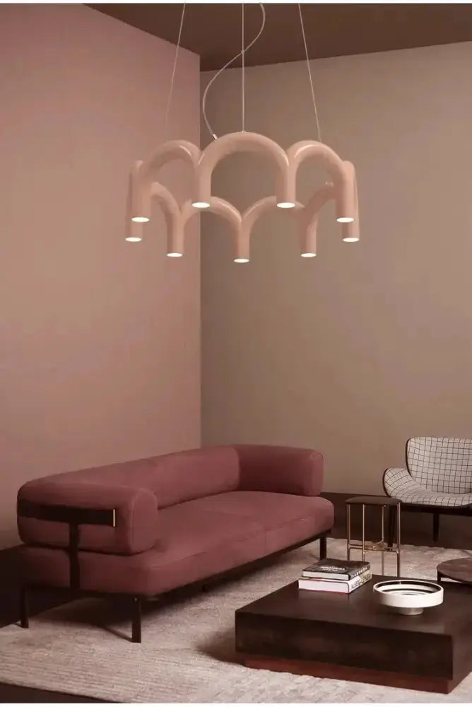 Chandelier Decorbites modern u-shaped pendant in pale pink with curved arches on Tampa Home & Garden Store