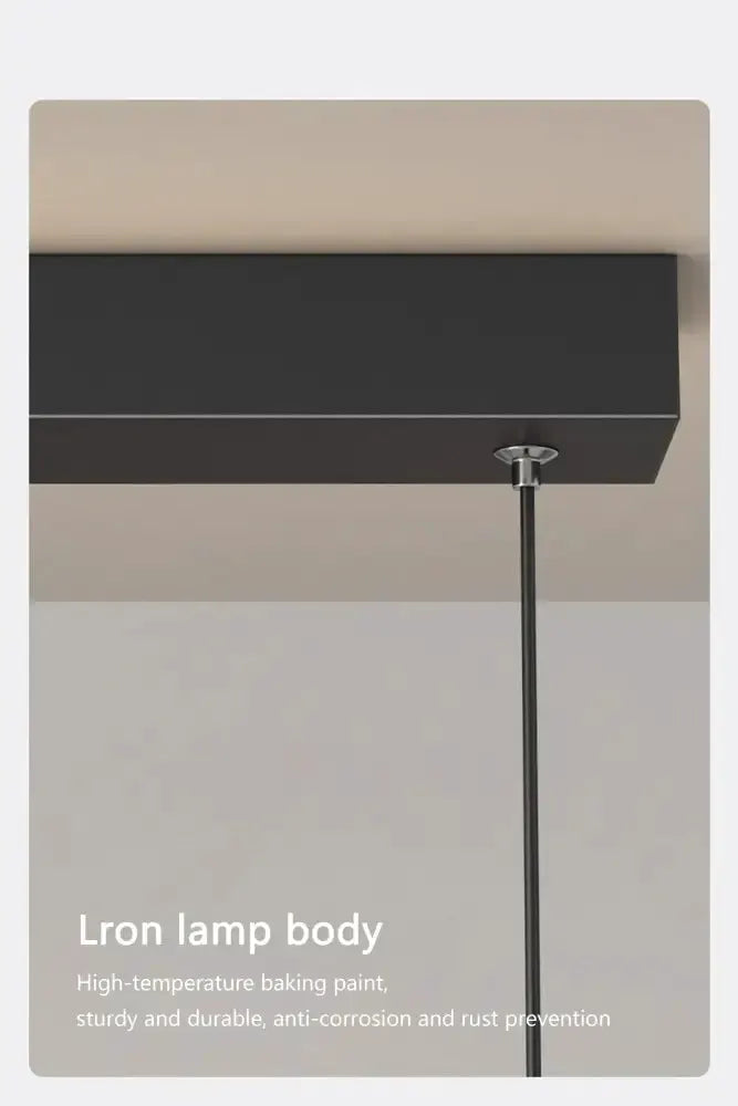 Sleek wavy pendant light, brushed metallic finish by Decorbites for dining room on Tampa Home & Garden Store