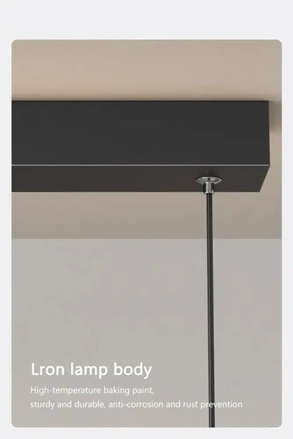 Sleek wavy pendant light, brushed metallic finish by Decorbites for dining room on Tampa Home & Garden Store