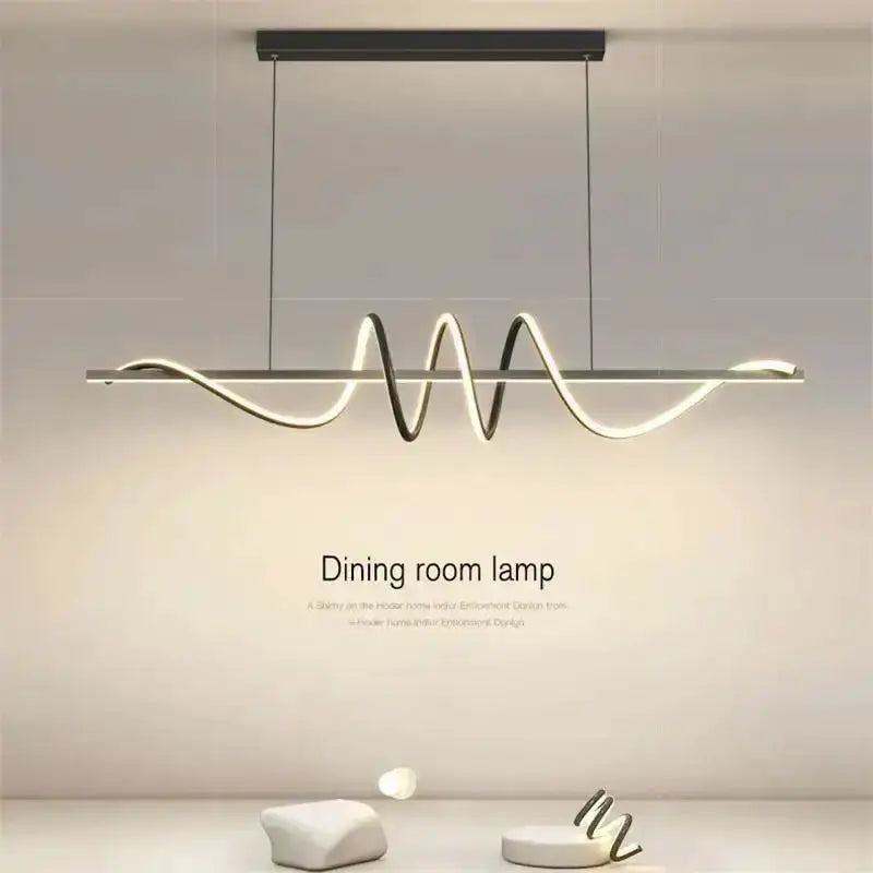 Sleek wavy pendant light with brushed metallic finish for dining room, LED glow on Tampa Home & Garden Store