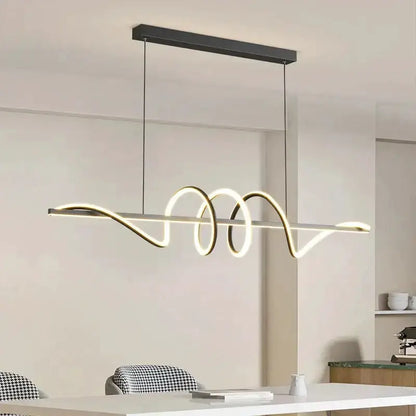 Sleek wavy pendant light by Decorbites in brushed metallic finish for dining room on Tampa Home & Garden Store