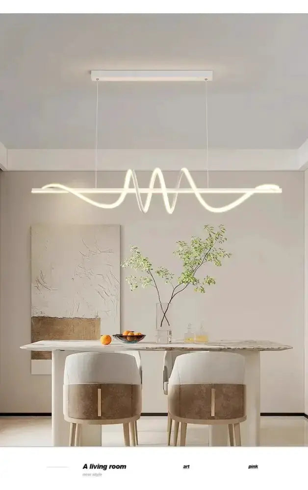 Sleek wavy pendant light by Decorbites, brushed metallic finish for dining room on Tampa Home & Garden Store