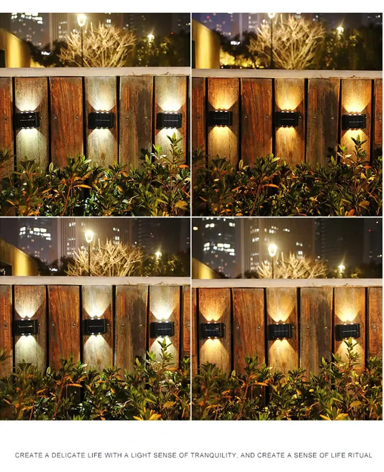 Black solar wall light set of four by Decorbites along a wooden fence with warm glow on Tampa Home & Garden Store