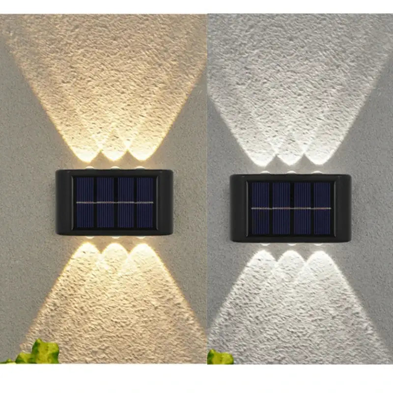 Black solar wall light Decorbites, wall-mounted solar lighting with warm and cool glow on Tampa Home & Garden Store