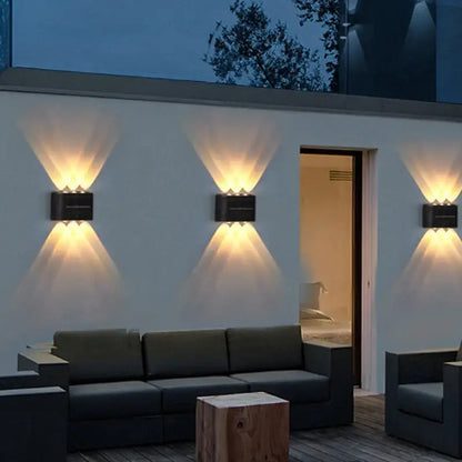 Decorbites Black Solar Wall Light outdoor wall-mount fixtures with warm glow (3) on Tampa Home & Garden Store