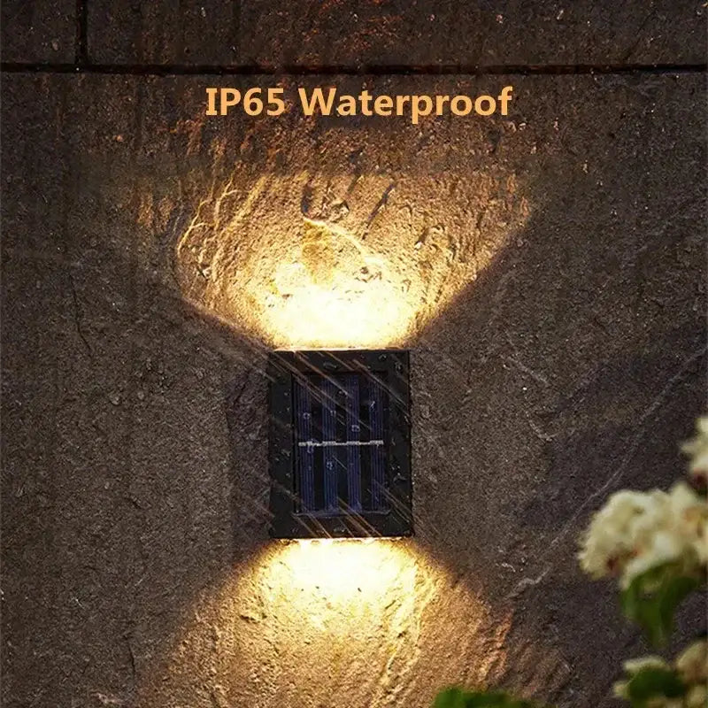 Black solar wall light by Decorbites, IP65 waterproof outdoor lighting fixture on Tampa Home & Garden Store