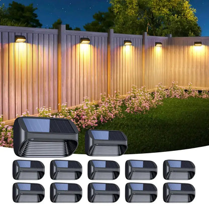 Modern black solar powered fence lights for yard steps; compact landscape path lights along a wooden fence on Tampa Home & Garden Store