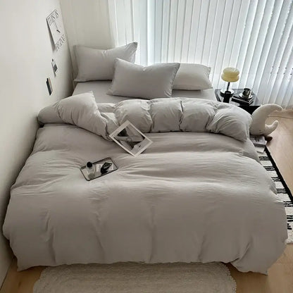 Gray quilted cotton duvet cover bedding set by Decorbites on a neatly made bed on Tampa Home & Garden Store