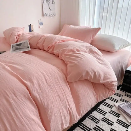 Gray quilted cotton duvet cover bedding set by Decorbites on bed in pink-toned room on Tampa Home & Garden Store