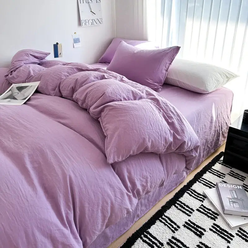 Decorbites lavender quilted cotton duvet cover bedding set on bed with pillows on Tampa Home & Garden Store