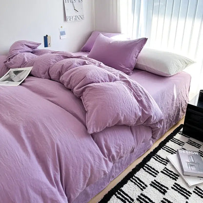 Decorbites lavender quilted cotton duvet cover bedding set on bed with pillows on Tampa Home & Garden Store