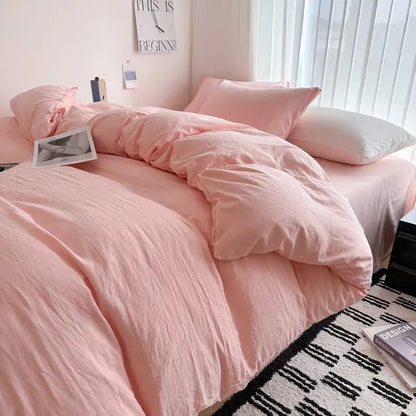 Pink quilted cotton duvet cover bedding set on bed in a bright bedroom on Tampa Home & Garden Store