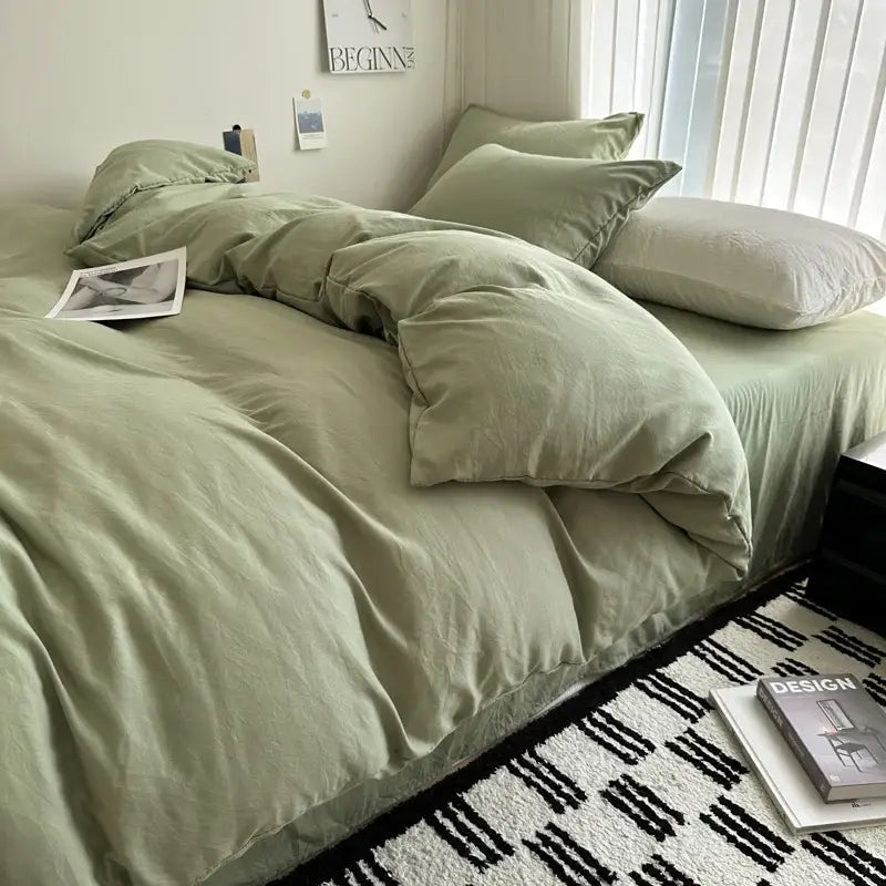 Gray quilted cotton duvet cover bedding set by Decorbites on bed with matching pillows on Tampa Home & Garden Store