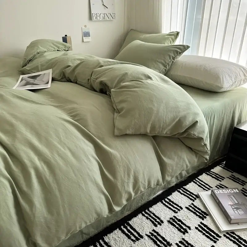 Gray quilted cotton duvet cover set by Decorbites on a bed with pillows in a bedroom on Tampa Home & Garden Store