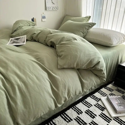 Gray quilted cotton duvet cover set by Decorbites on a bed with pillows in a bedroom on Tampa Home & Garden Store